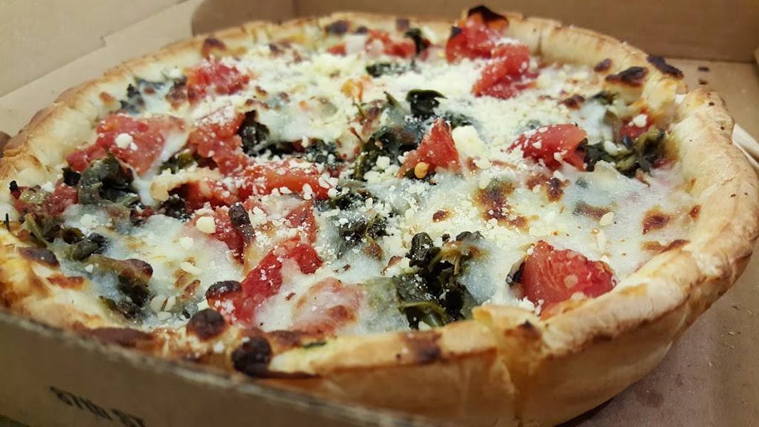 O'Hare Airport C18 Hours + Location Reggio's Pizza Home of The